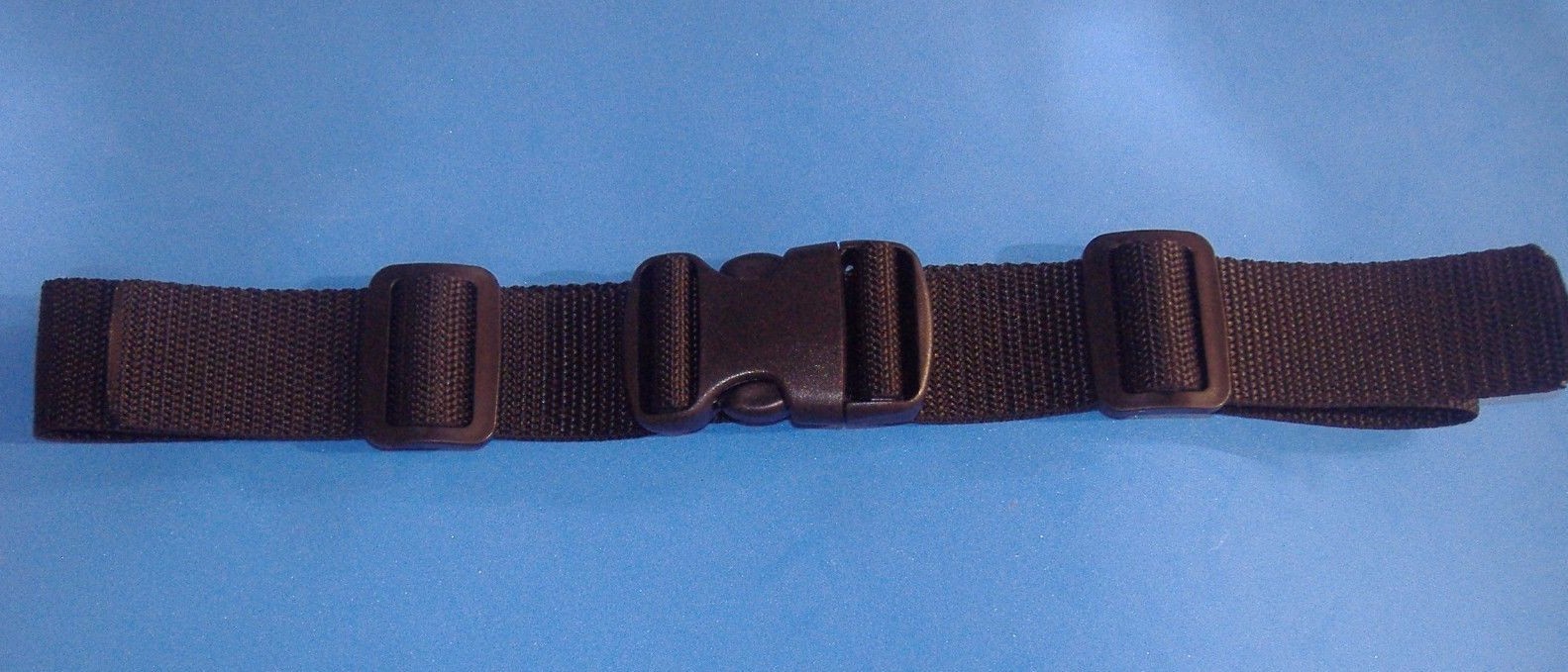 ADJUSTABLE NYLON WEB STRAP PLASTIC BUCKLE MAXIMUM 34″ LONG 1 1/2″ WIDE BLACK