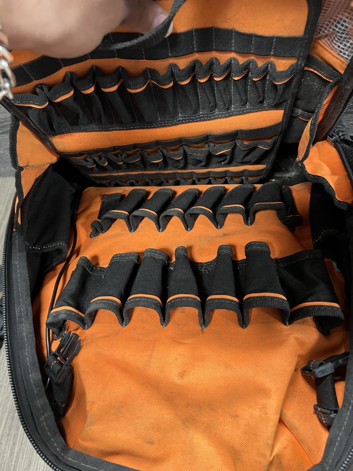 WELKINLAND 77 Pocket Large Tool Backpack Black/Orange Molded Base, Padded Handle